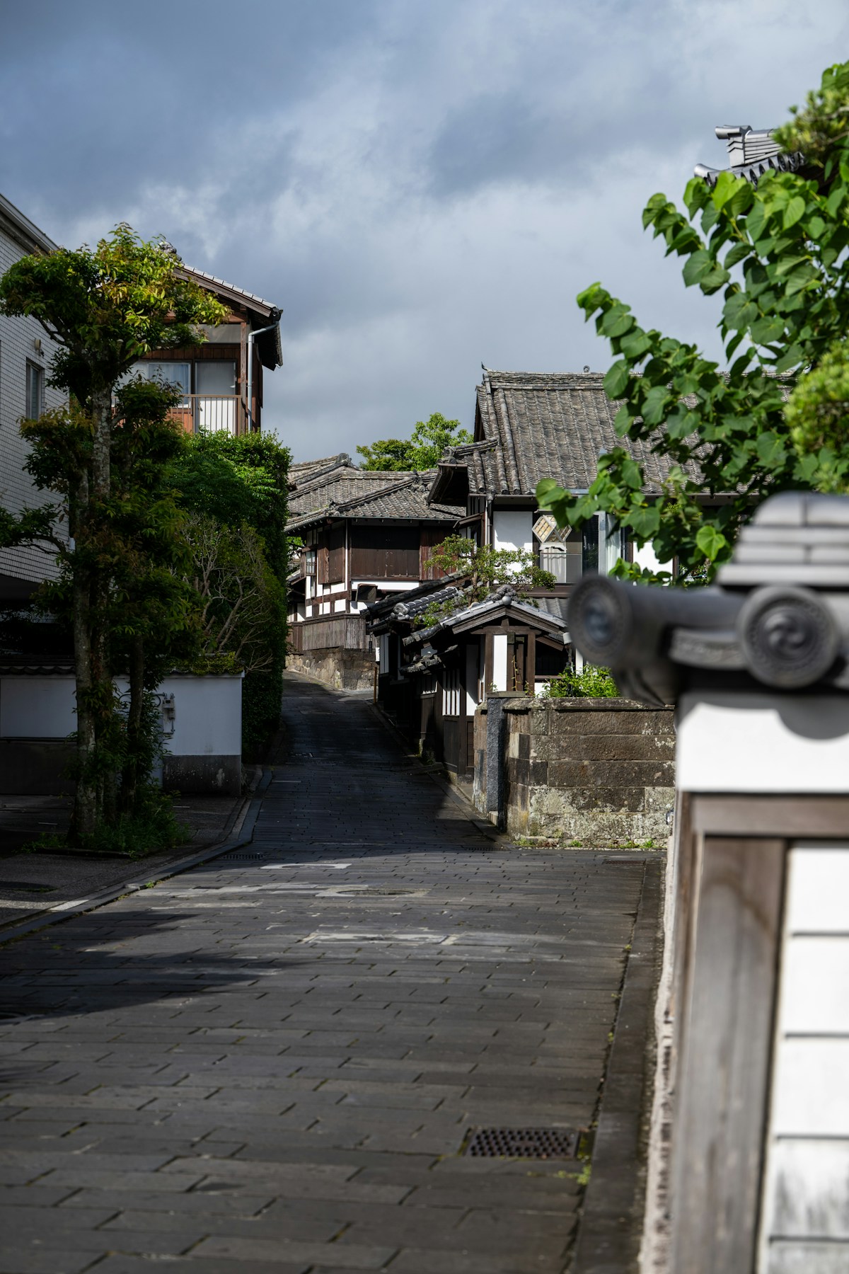 A quaint Japanese street lined with traditional homes