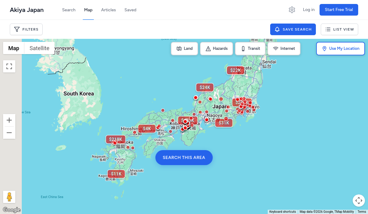 Akiya Japan map view showing property listings across Japan with layer toggles for Land, Hazards, Transit, and Internet