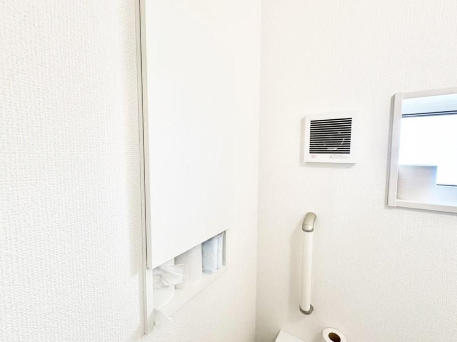 Wall-mounted ventilation fan in a clean Japanese toilet room from an Akiya Japan property listing