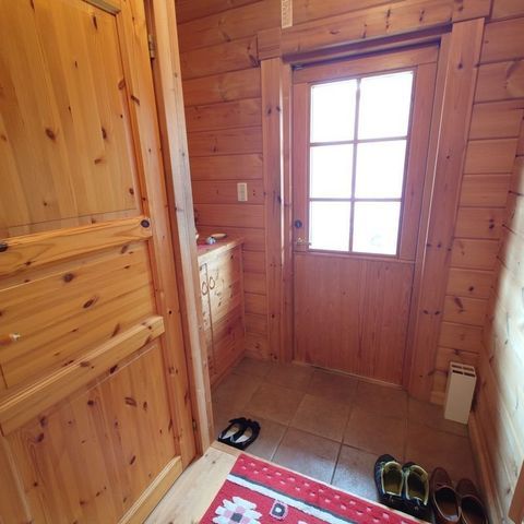 Log-Style 2SLDK House in Tomakomai, Hokkaido with Deck & Views - Image 1