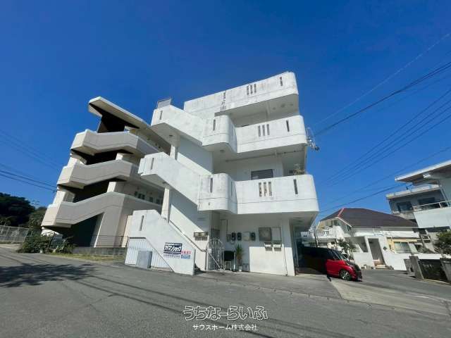 Shop-Apartment Building with Rental Income in Okinawa City - Image 1