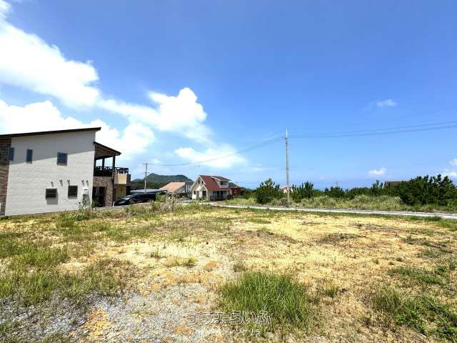 Land for Sale in Nakijin, Okinawa - Hillside Plot with Ocean Views - Image 1