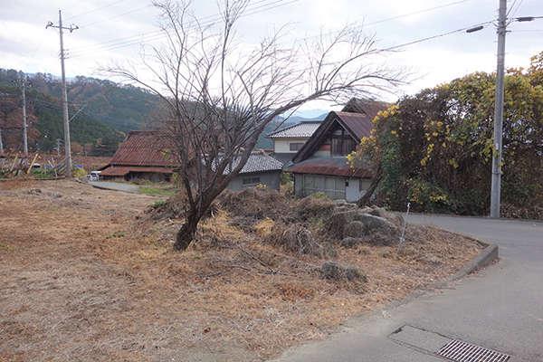 a hilly area down south with a view of Mt. Fuji in front - Thumbnail 2