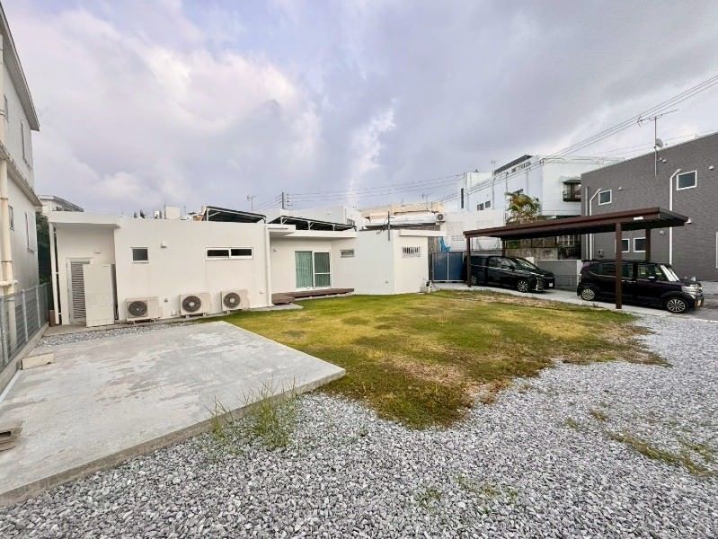 4LDK Detached House with Basement and Solar Panels in Okinawa City - Image 1